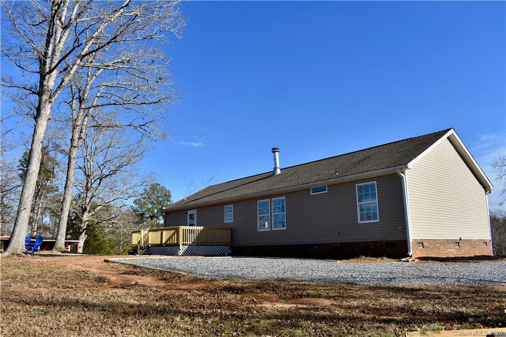 498 Ted Smith Road Rutherfordton, NC 28139 - Photo 26 of 38 a front view of a house with a yard