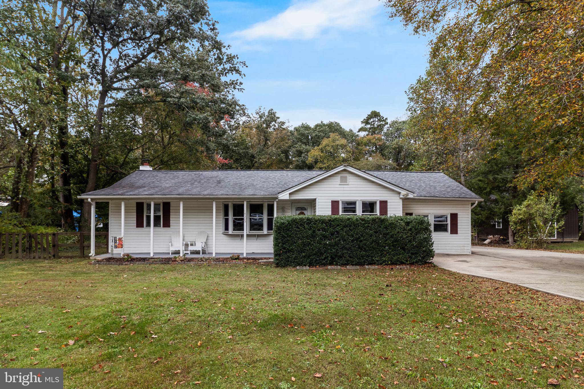 14305 Duckett Road Brandywine, MD 20613 - Photo 19 of 35 a front view of a house with a garden
