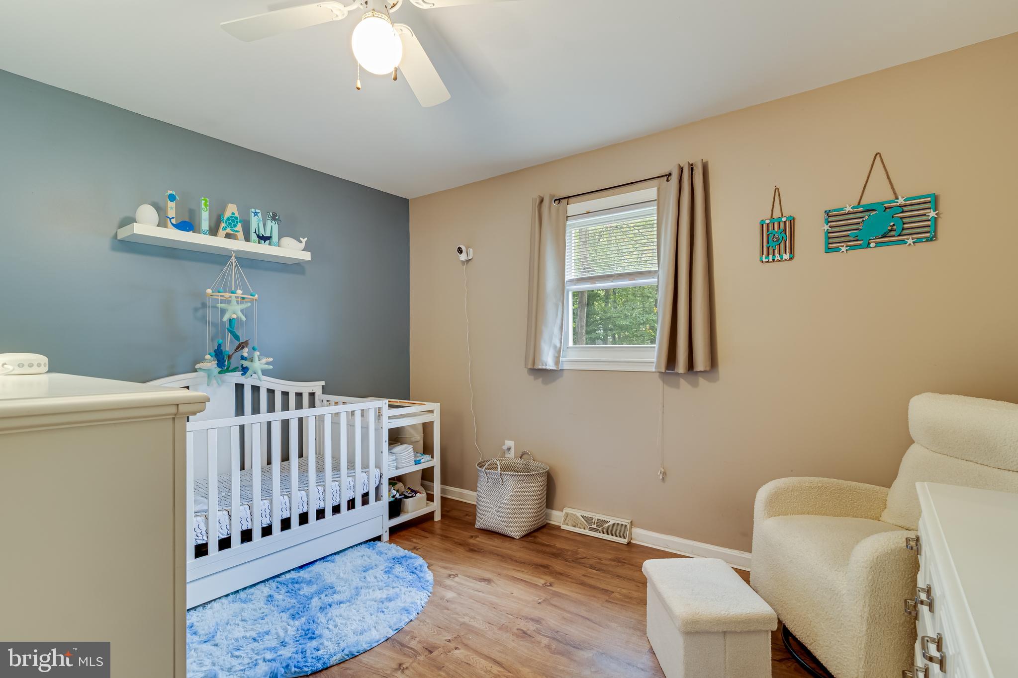 14305 Duckett Road Brandywine, MD 20613 - Photo 21 of 35 a bedroom with furniture and a window