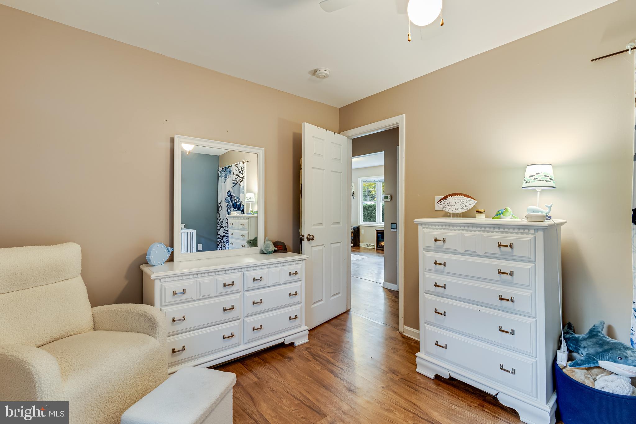 14305 Duckett Road Brandywine, MD 20613 - Photo 22 of 35 a room with a dresser and a mirror