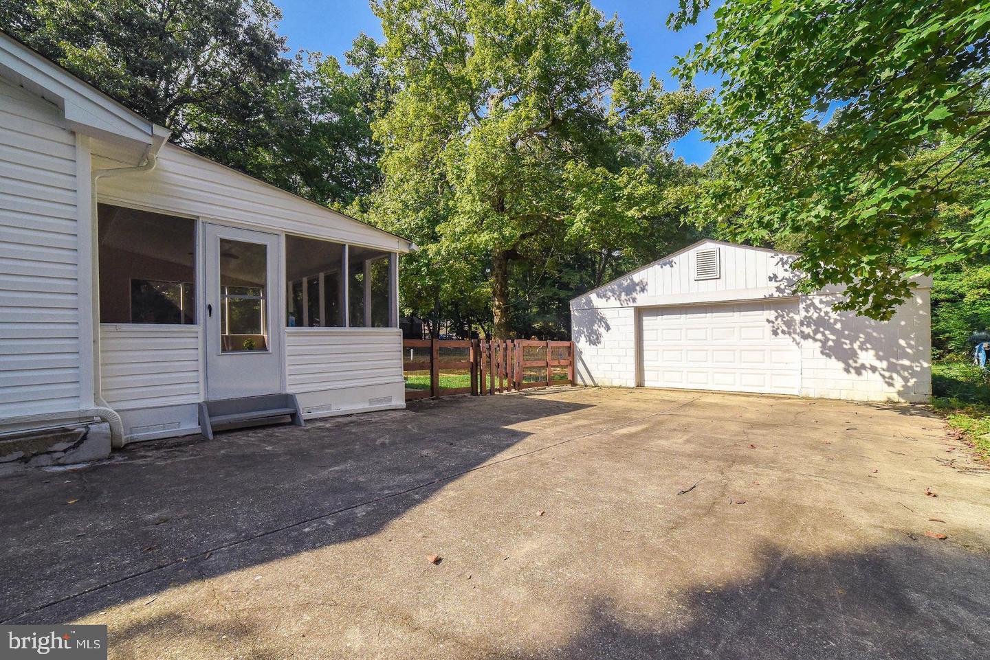 14305 Duckett Road Brandywine, MD 20613 - Photo 4 of 35 a backyard of a house with oven and garage