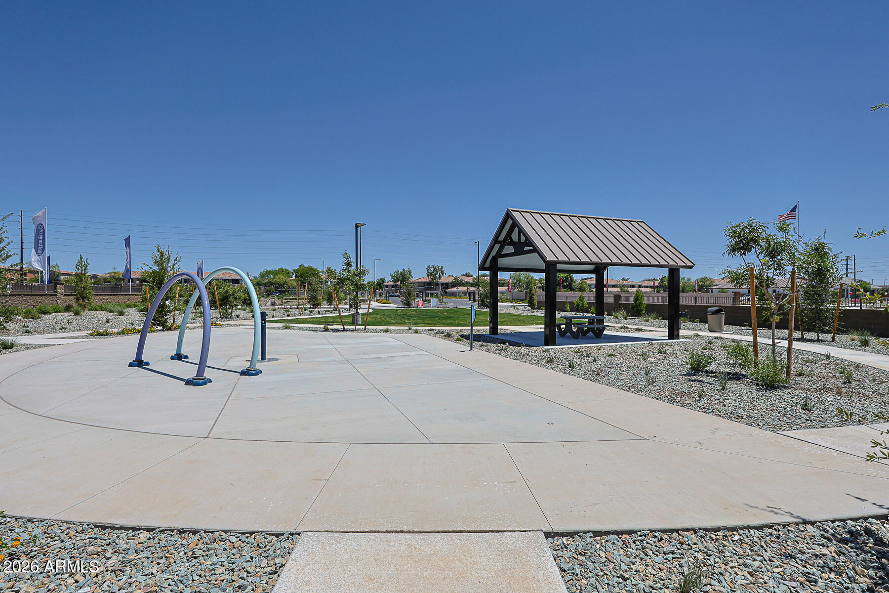 8032 West Berkeley Road Phoenix, AZ 85035 - Photo 4 of 8 a view of a park with a bench and trees