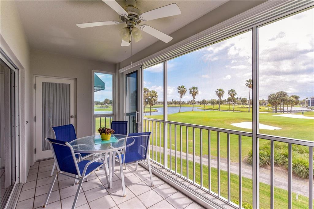 145 Northeast Edgewater Drive, Unit 4105 Stuart, FL 34996 - Photo 3 of 36 a view of a dining room with furniture window and outside view