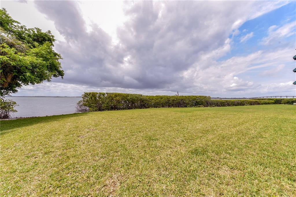 145 Northeast Edgewater Drive, Unit 4105 Stuart, FL 34996 - Photo 32 of 36 a view of an ocean and beach