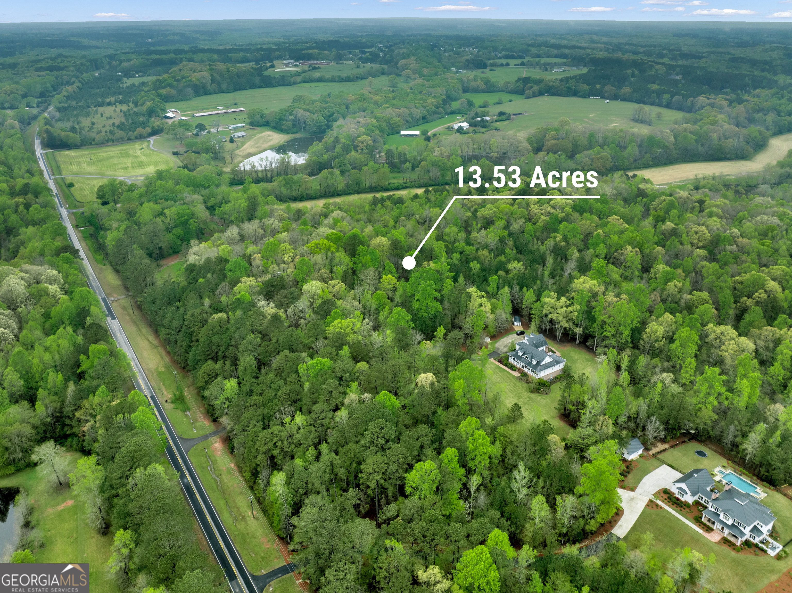 5211 High Shoals Road Bishop, GA 30621 - Photo 1 of 1 an aerial view of a garden with houses