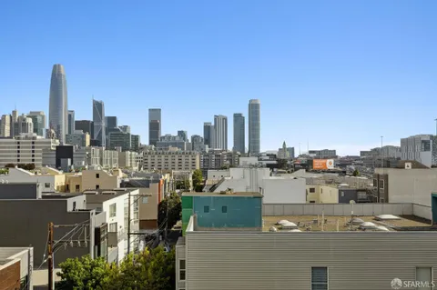 a view of a city with tall buildings