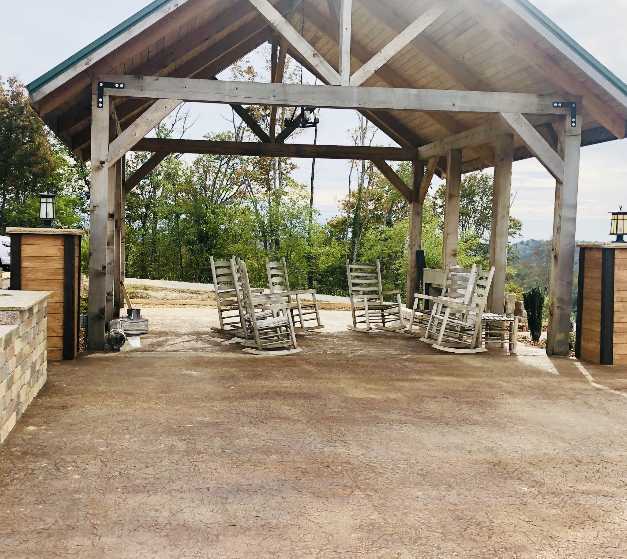 35 C Lot 35c - Swan Ridge Road Celina, TN 38551 - Photo 13 of 14 a view of a patio with table and chairs under an umbrella