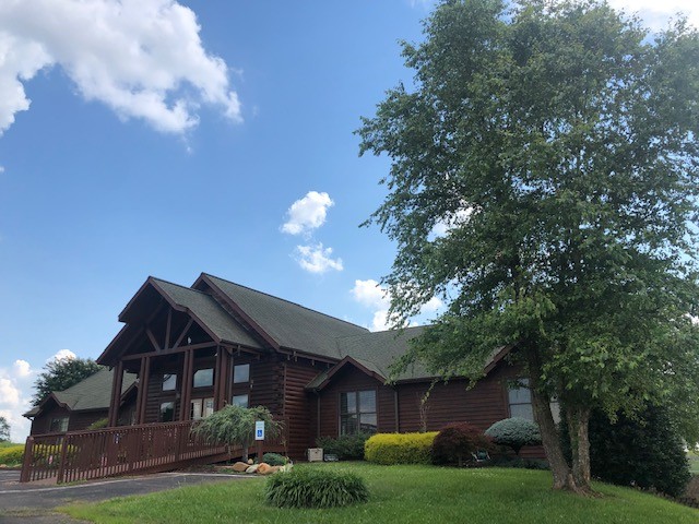 35 C Lot 35c - Swan Ridge Road Celina, TN 38551 - Photo 8 of 14 a front view of a house with garden