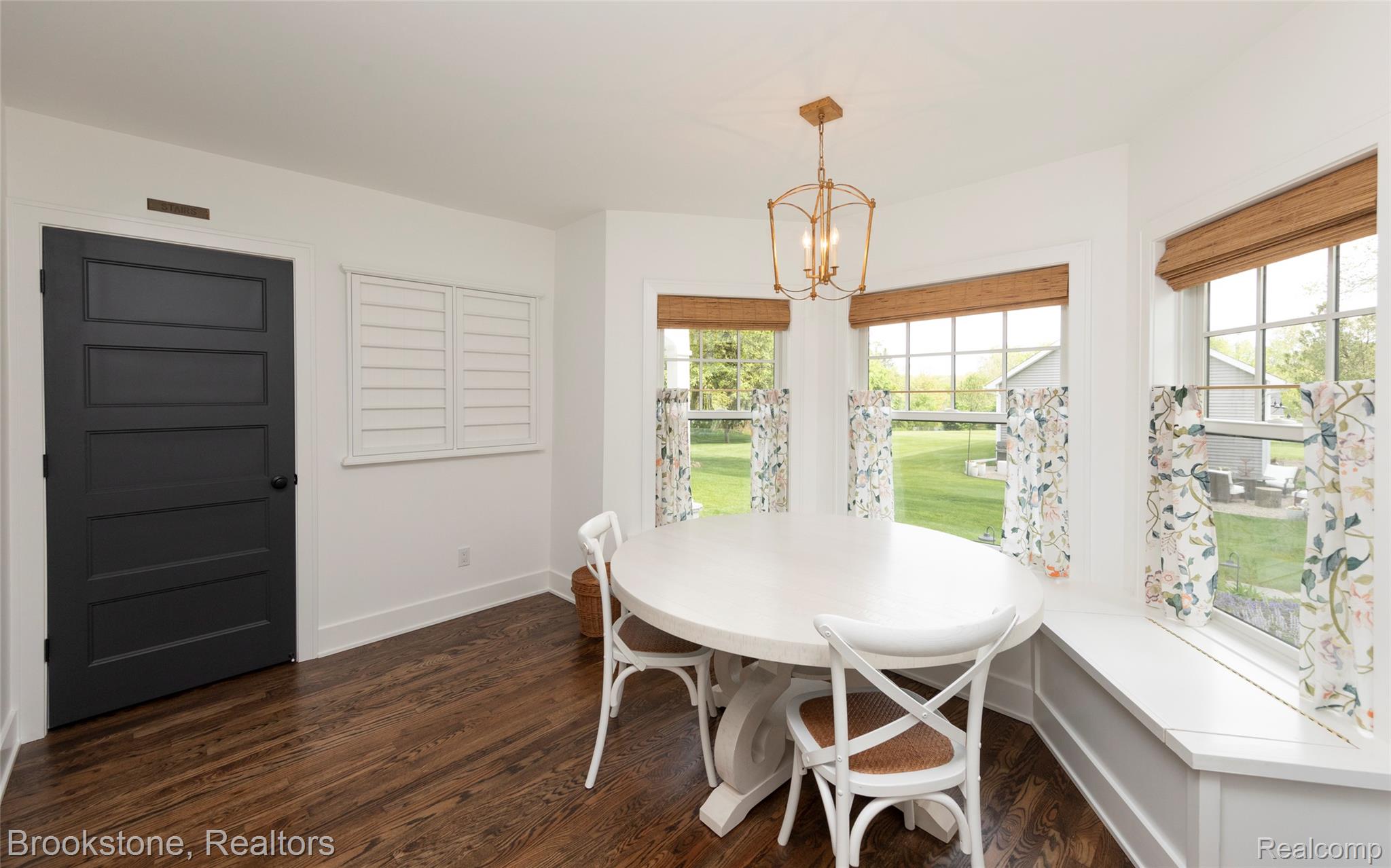 8322 Buckell Lake Road Holly, MI 48442 - Photo 39 of 58 Spacious keeping room is a true flex space like in the olden days