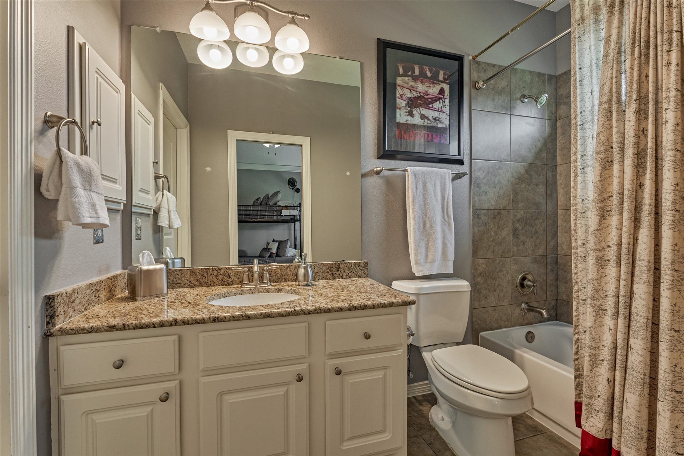 67 South Sage Sparrow Circle Spring, TX 77389 - Photo 38 of 49 a bathroom with a granite countertop sink toilet and shower