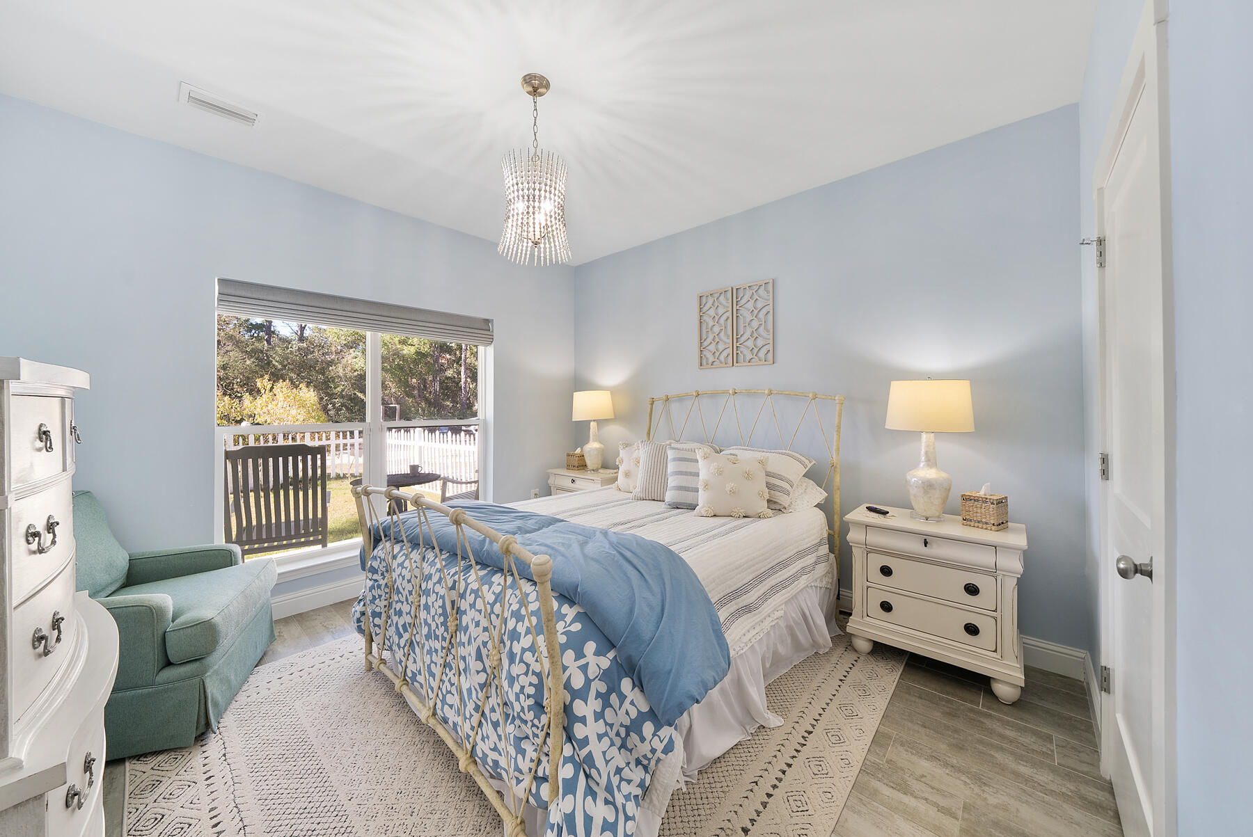 115 Barcelona Avenue Santa Rosa Beach, FL 32459 - Photo 14 of 34 a bedroom with a large bed and a window