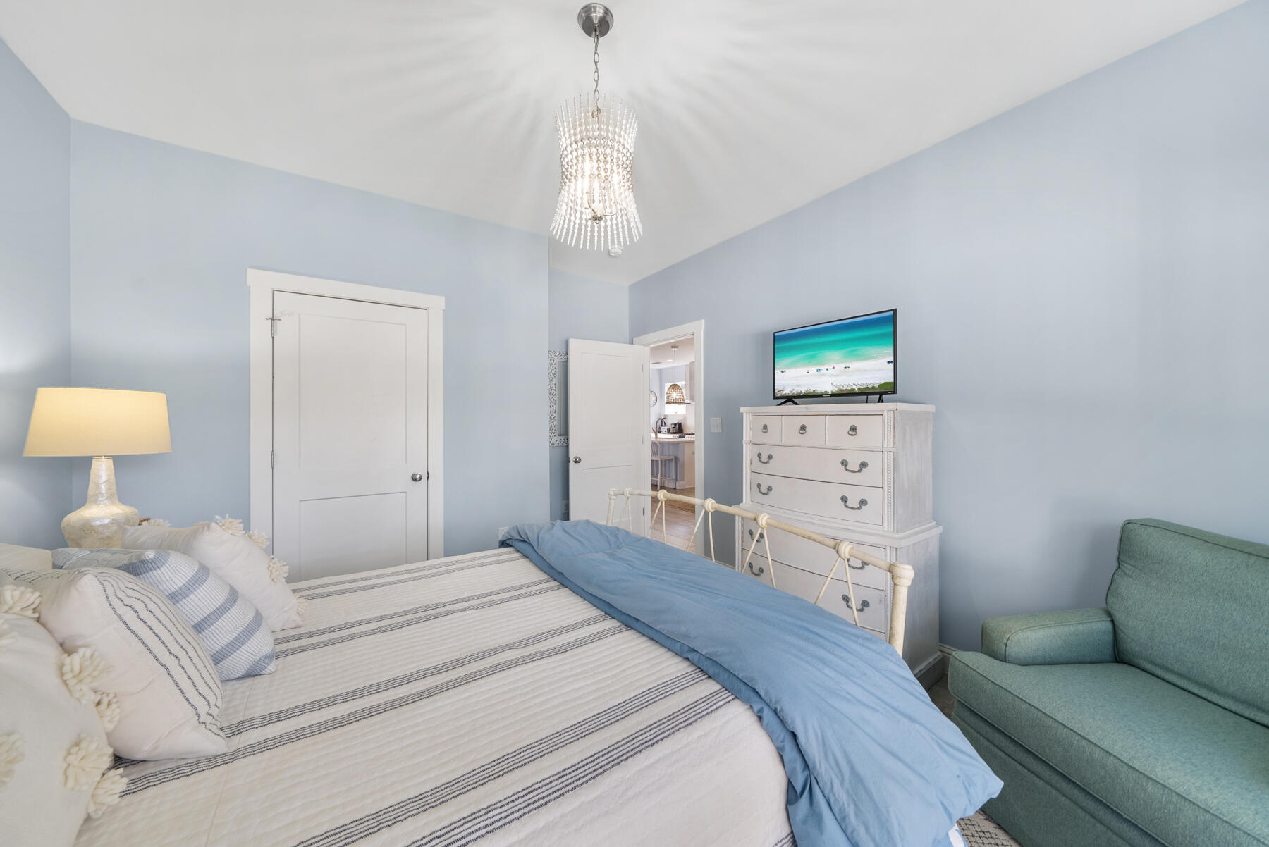 115 Barcelona Avenue Santa Rosa Beach, FL 32459 - Photo 15 of 34 a bedroom with a bed and ceiling fan
