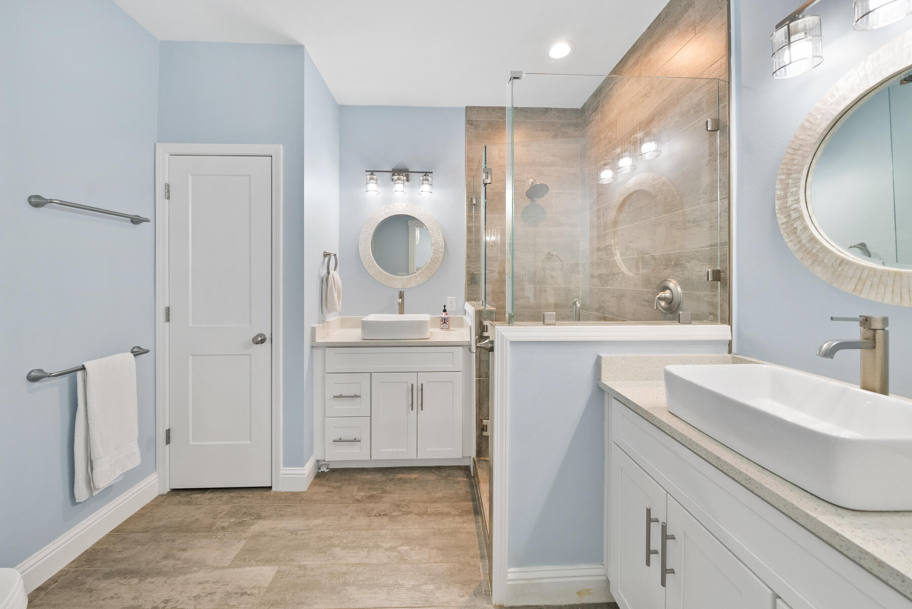 115 Barcelona Avenue Santa Rosa Beach, FL 32459 - Photo 16 of 34 a bathroom with a sink a toilet and a mirror