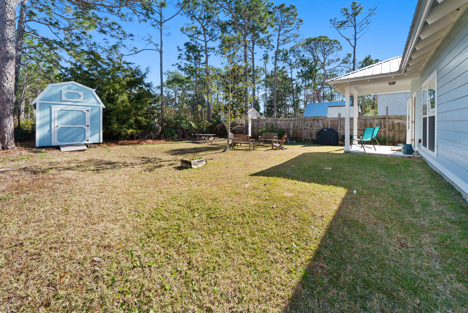 115 Barcelona Avenue Santa Rosa Beach, FL 32459 - Photo 20 of 34 a view of a yard with a house