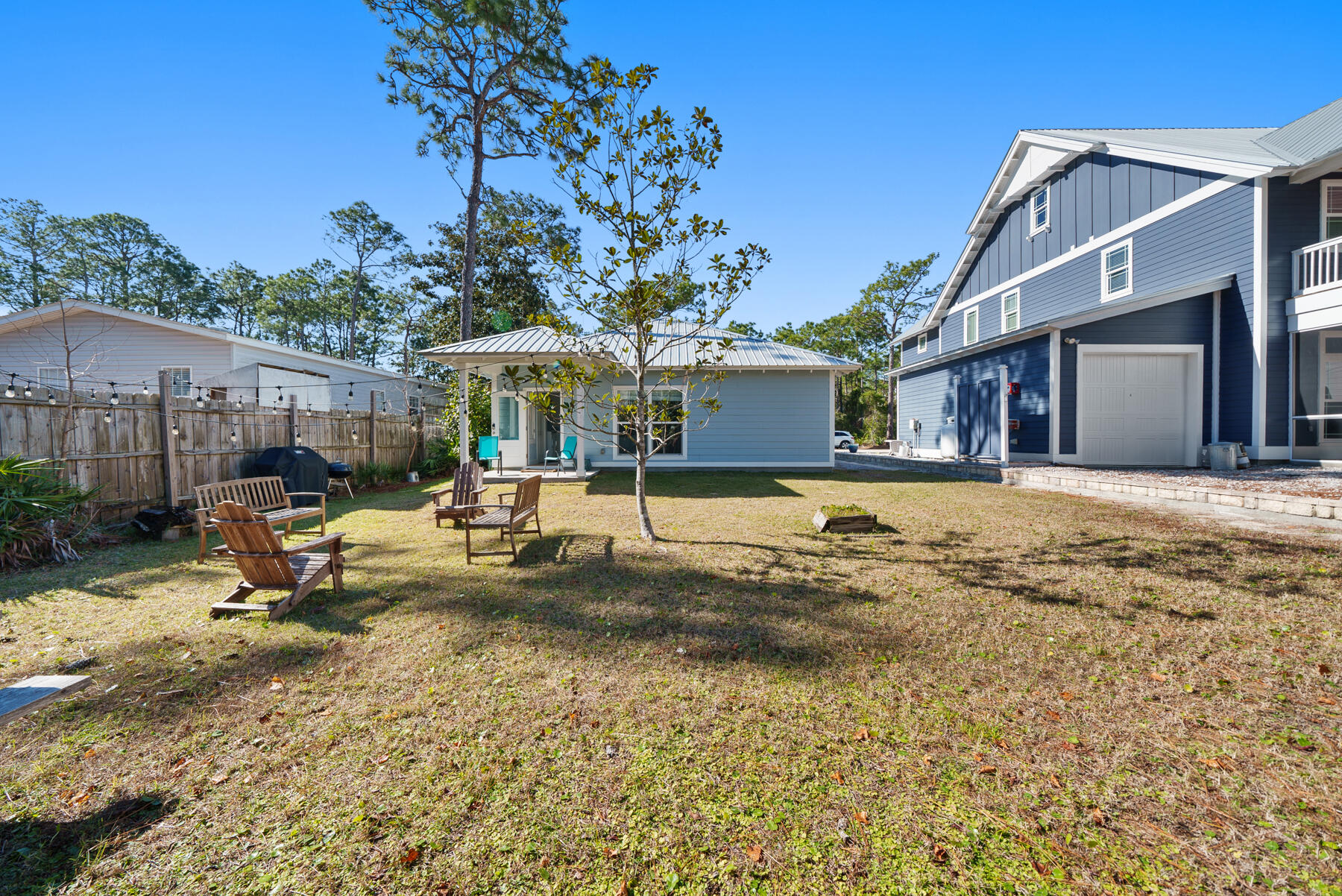 115 Barcelona Avenue Santa Rosa Beach, FL 32459 - Photo 21 of 34 a view of a house with swimming pool and sitting area