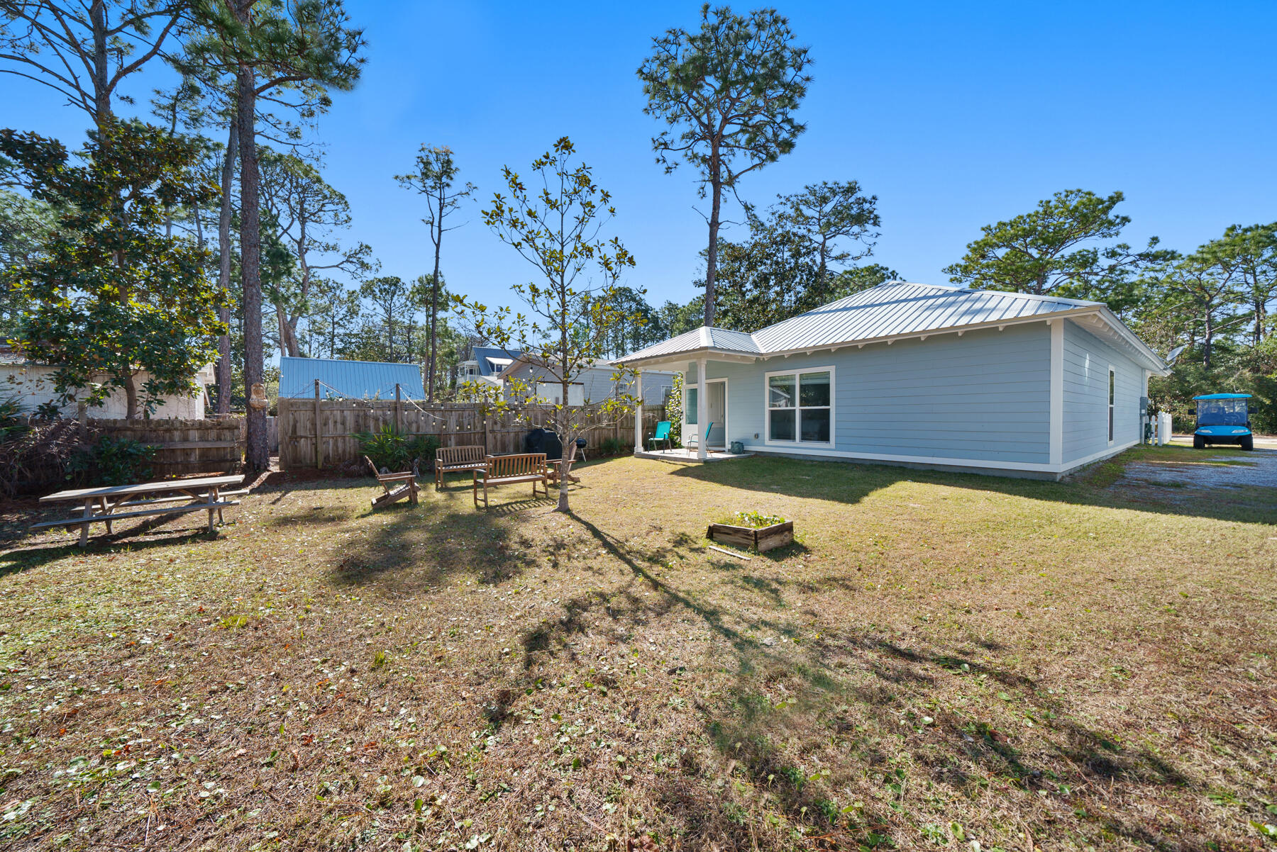 115 Barcelona Avenue Santa Rosa Beach, FL 32459 - Photo 22 of 34 a view of a house with a yard
