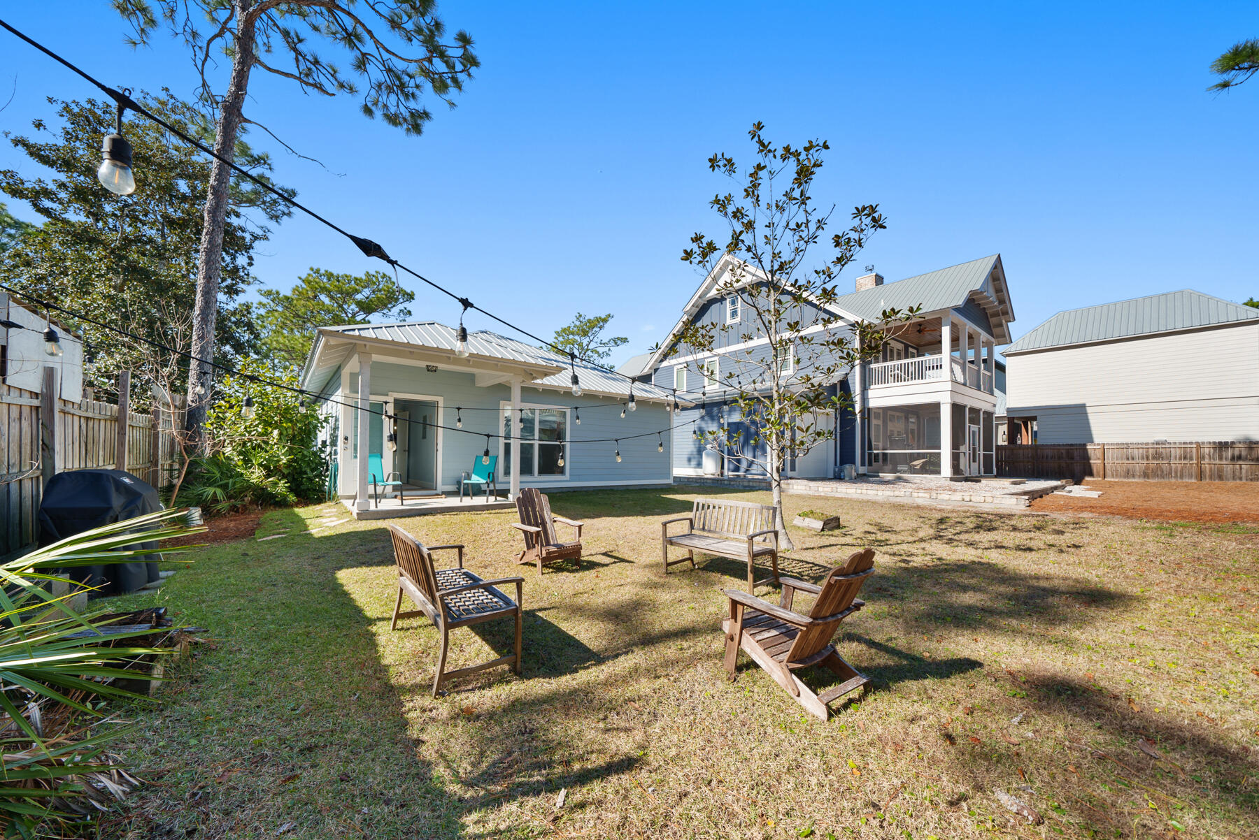 115 Barcelona Avenue Santa Rosa Beach, FL 32459 - Photo 23 of 34 a view of a house with backyard porch and sitting area