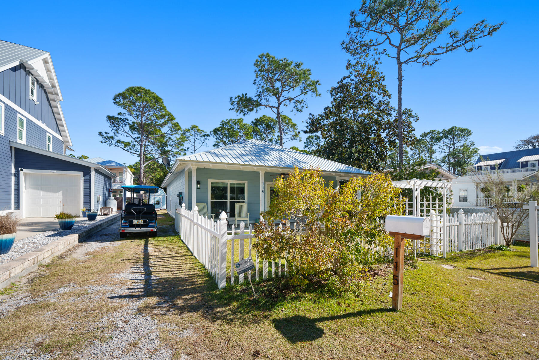 115 Barcelona Avenue Santa Rosa Beach, FL 32459 - Photo 25 of 34 a front view of a house with garden