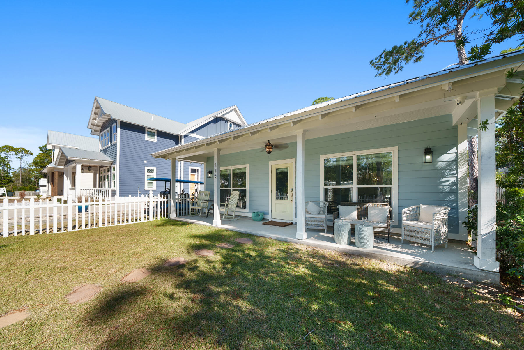 115 Barcelona Avenue Santa Rosa Beach, FL 32459 - Photo 26 of 34 a view of a house with backyard porch and sitting area