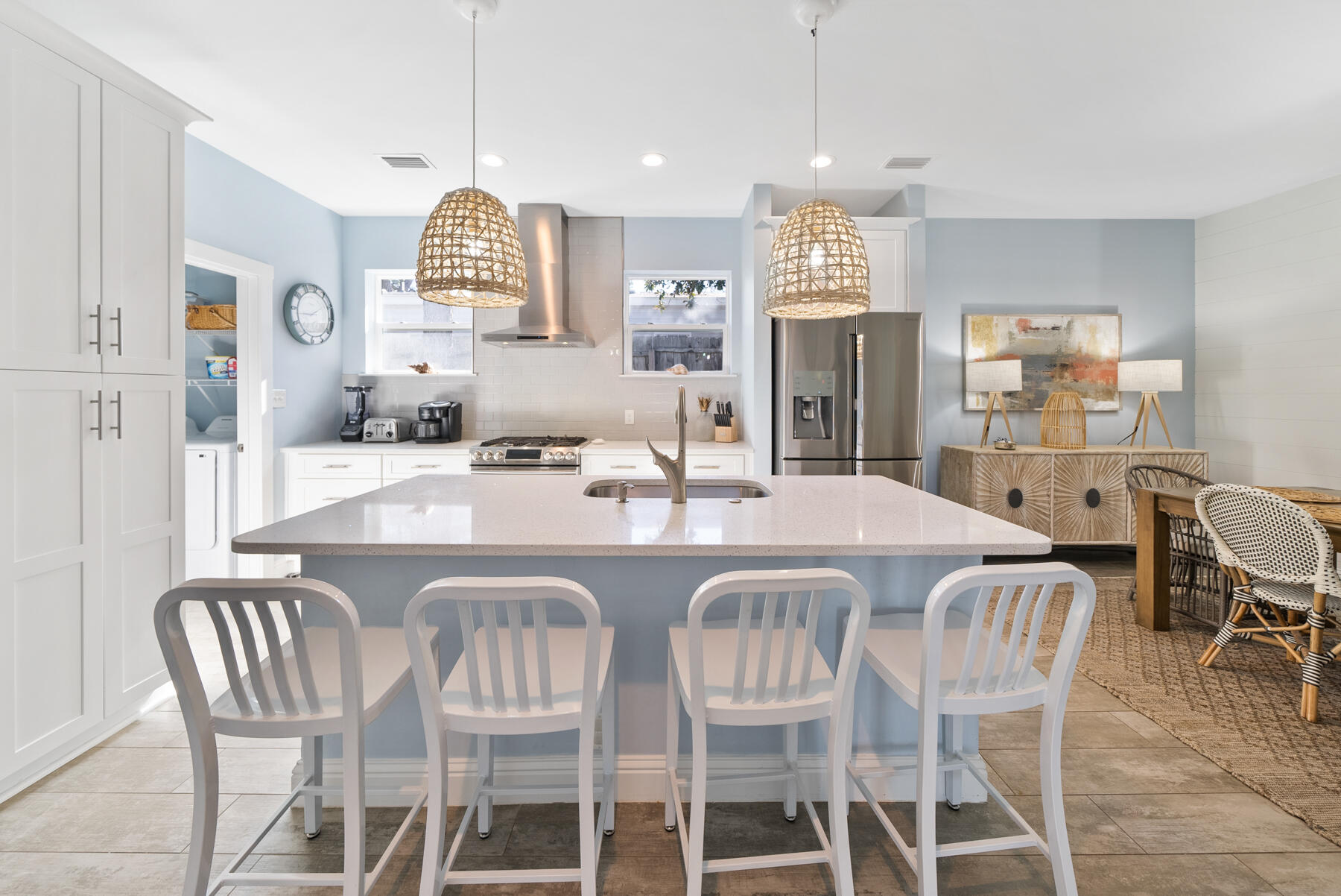 115 Barcelona Avenue Santa Rosa Beach, FL 32459 - Photo 5 of 34 a large kitchen with a dining table and chairs