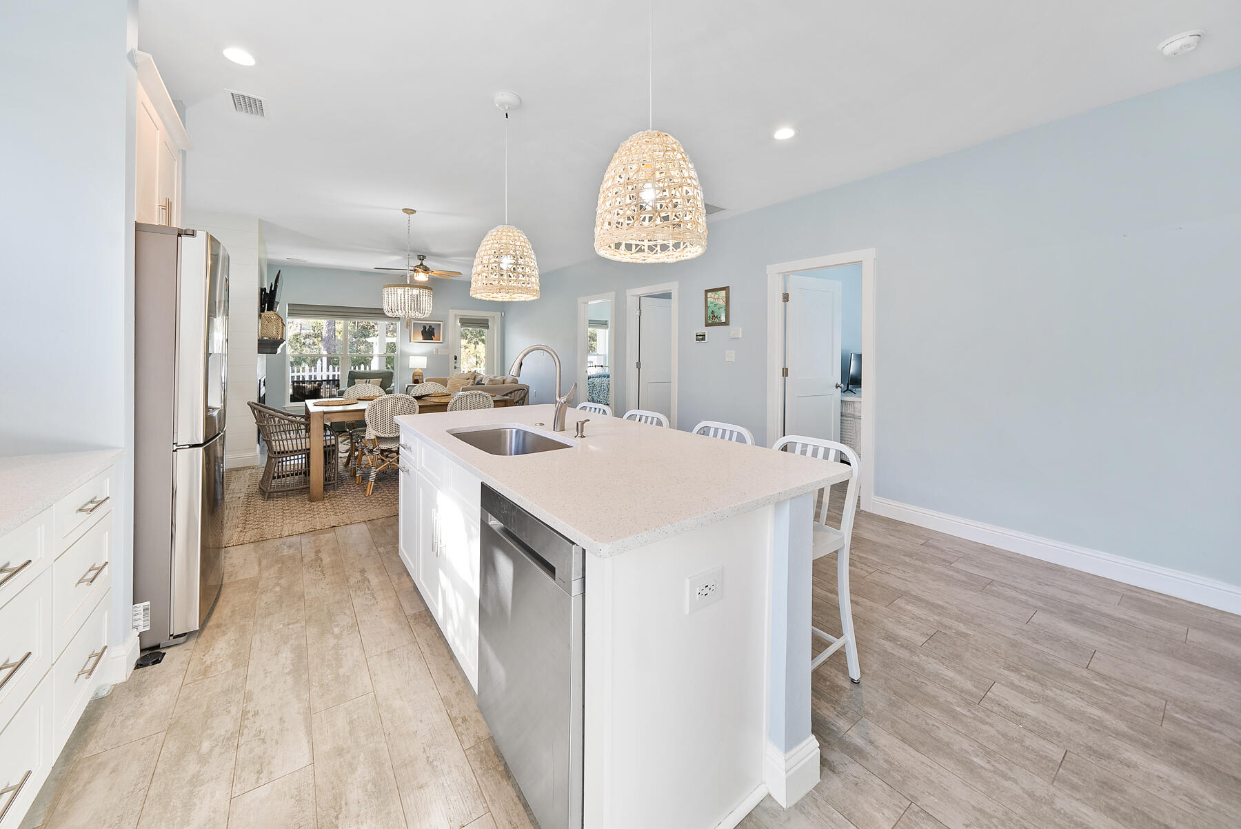 115 Barcelona Avenue Santa Rosa Beach, FL 32459 - Photo 7 of 34 an open kitchen with a table and chairs