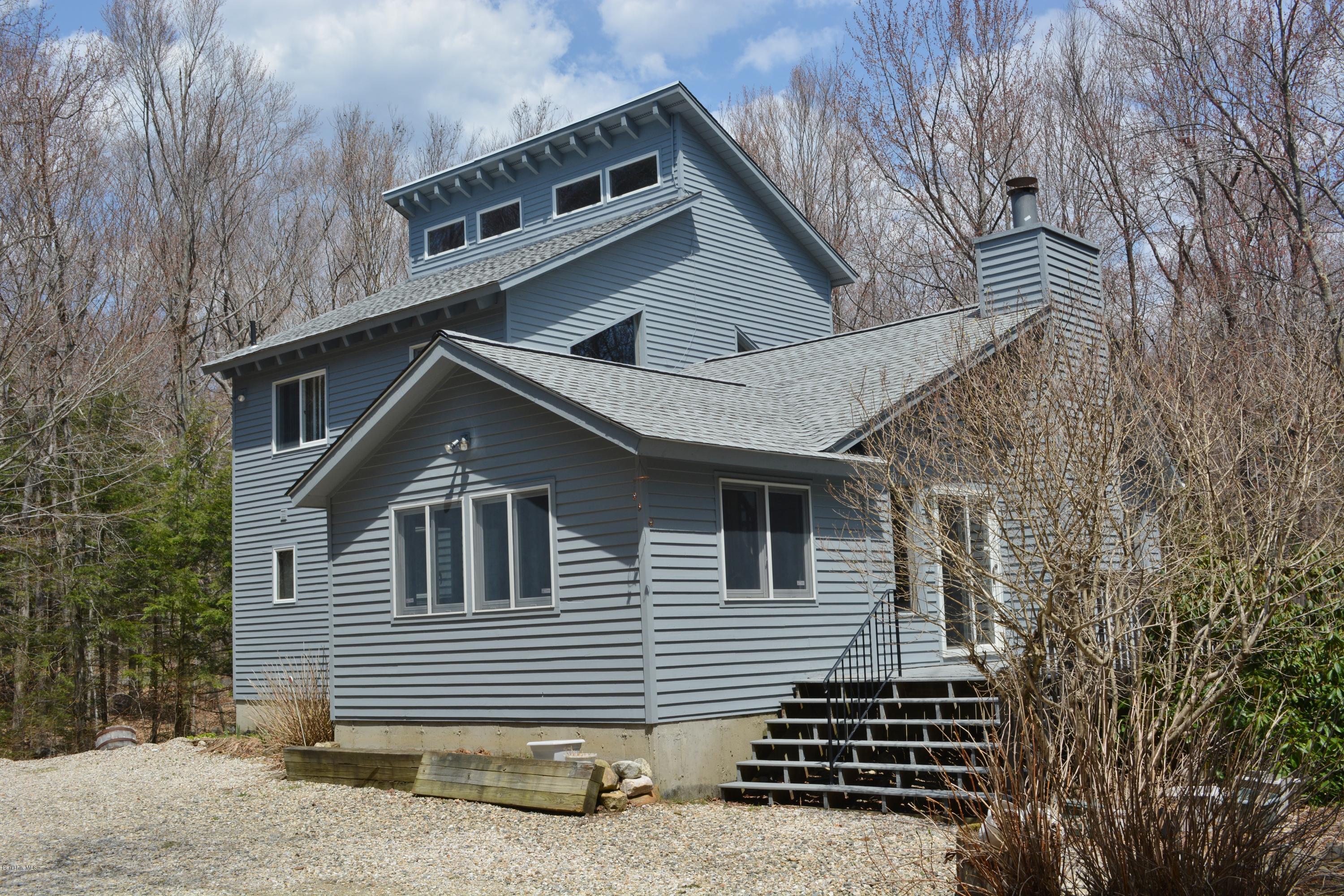 7 Sioux Road Becket, MA 01223 - Photo 1 of 22 a view of a house with a yard