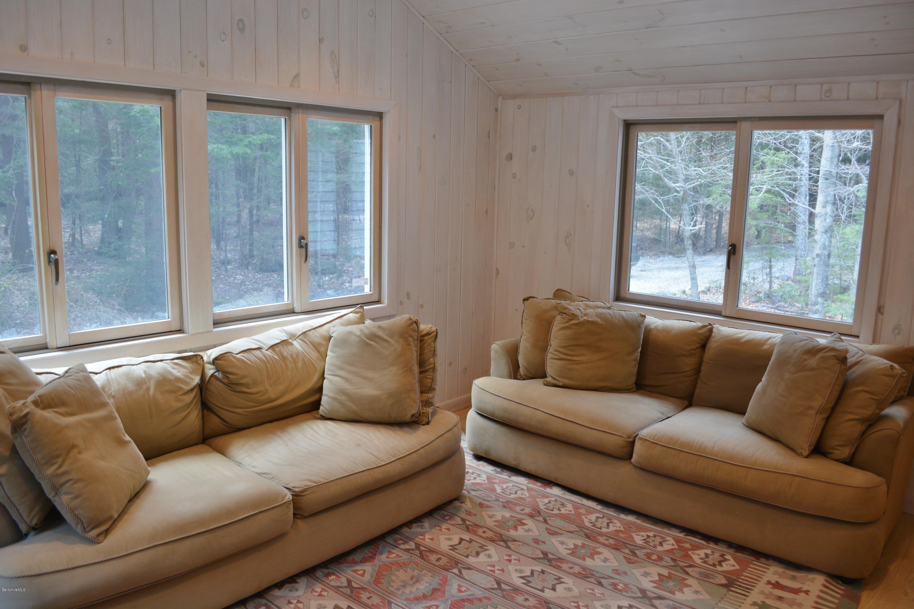 7 Sioux Road Becket, MA 01223 - Photo 8 of 22 a living room with furniture and a large window