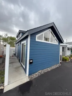 a front view of a house with garage