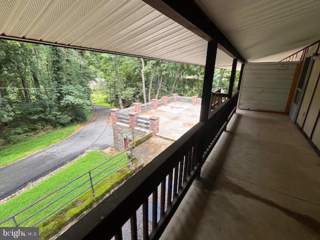 65 Meadow Glen Lane Reading, PA 19607 - Photo 20 of 28 a view of two chairs in the balcony