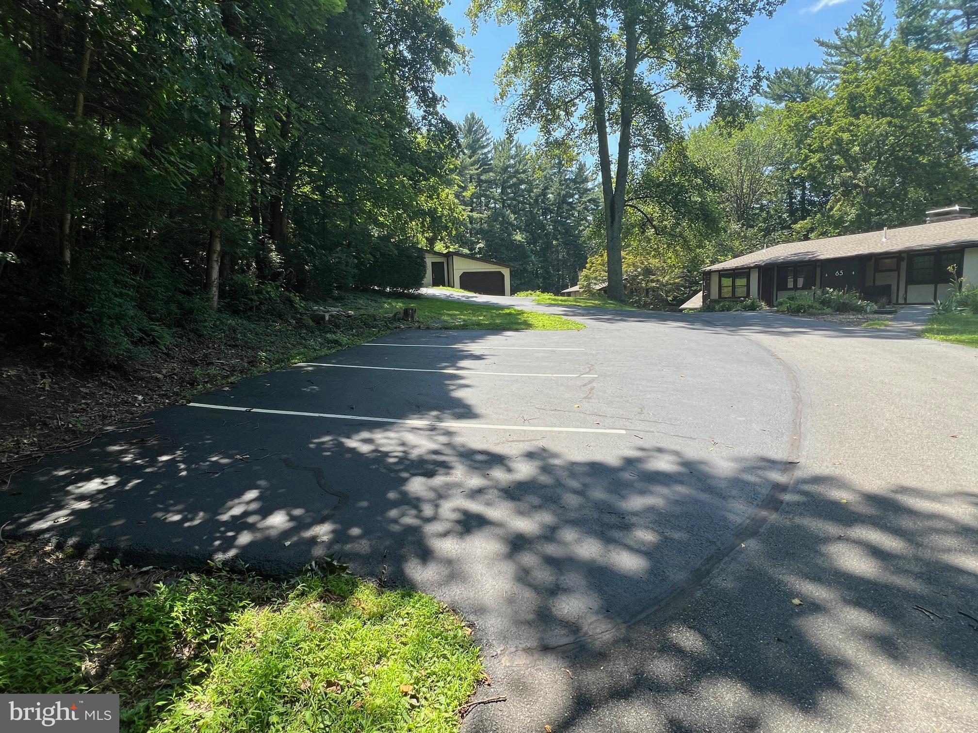 65 Meadow Glen Lane Reading, PA 19607 - Photo 4 of 28 a view of a backyard with swimming pool