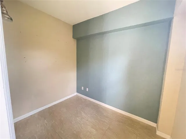 a view of a backyard house with lots of green space