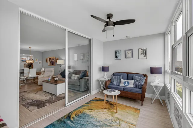 a living room with furniture and a rug