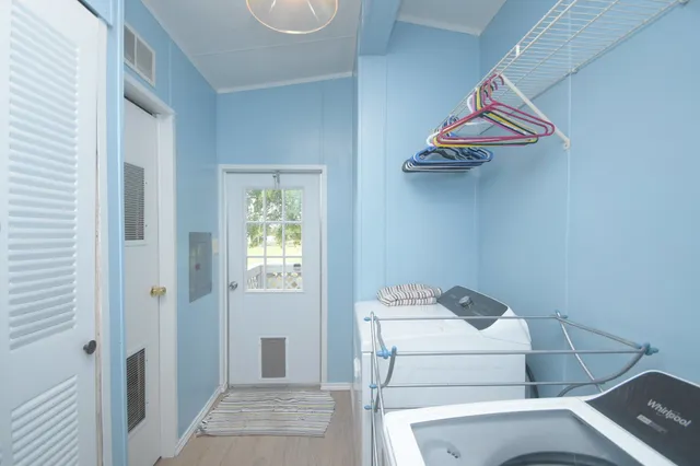 a utility room with dryer and washer
