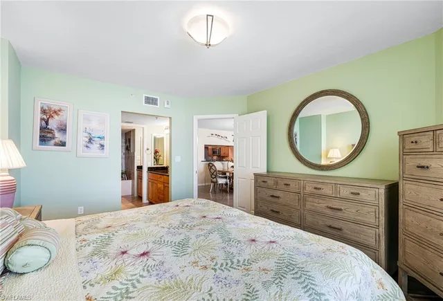 a white bath tub sitting next to a white toilet