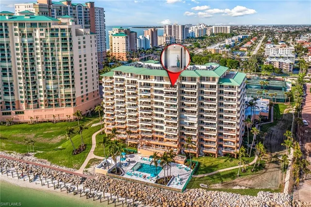a view of a livingroom with furniture and front door