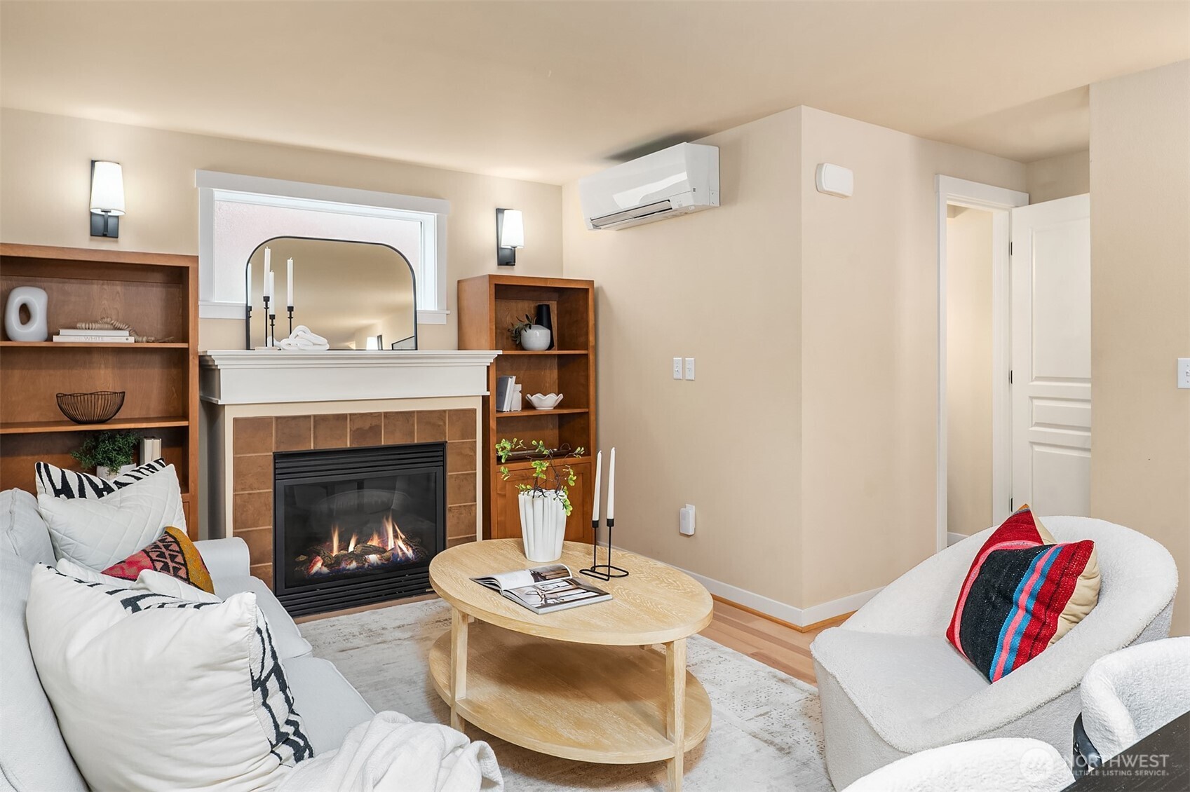 3615 Albion Place North, Unit B Seattle, WA 98103 - Photo 11 of 30 a living room with furniture and a fireplace