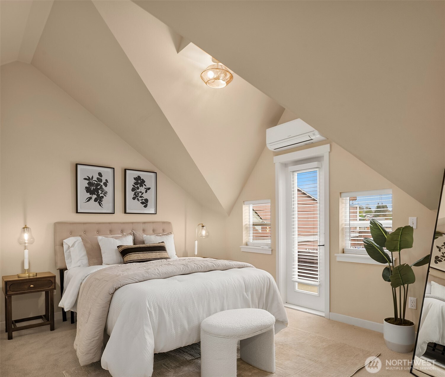 3615 Albion Place North, Unit B Seattle, WA 98103 - Photo 13 of 30 a spacious bedroom with a bed and glass door