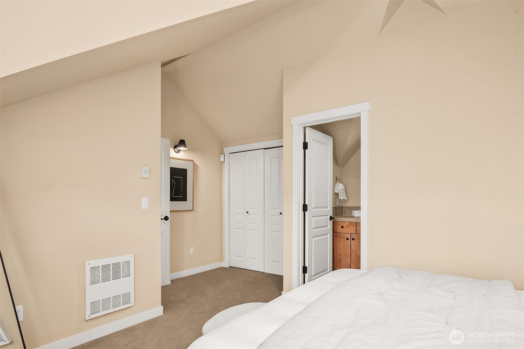 3615 Albion Place North, Unit B Seattle, WA 98103 - Photo 15 of 30 a bedroom with a bed and a closet