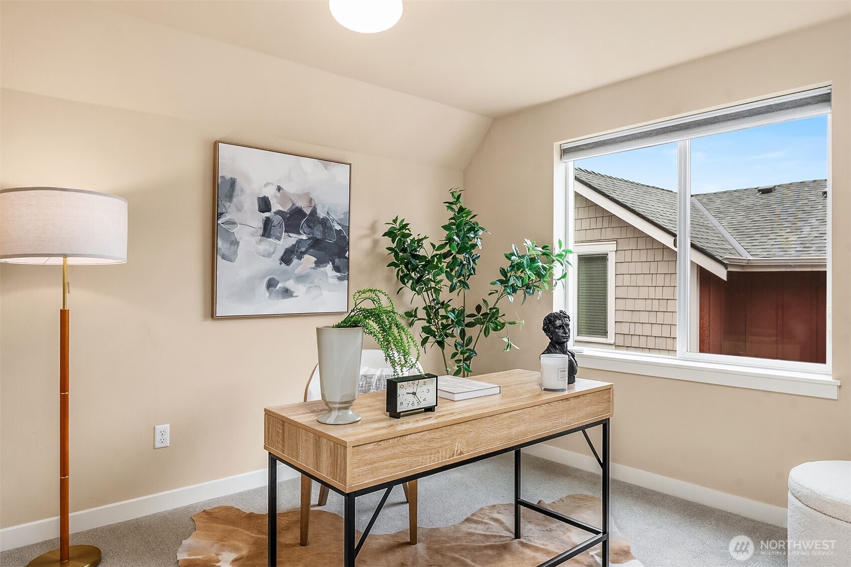 3615 Albion Place North, Unit B Seattle, WA 98103 - Photo 22 of 30 a view of a workspace with a table and chair
