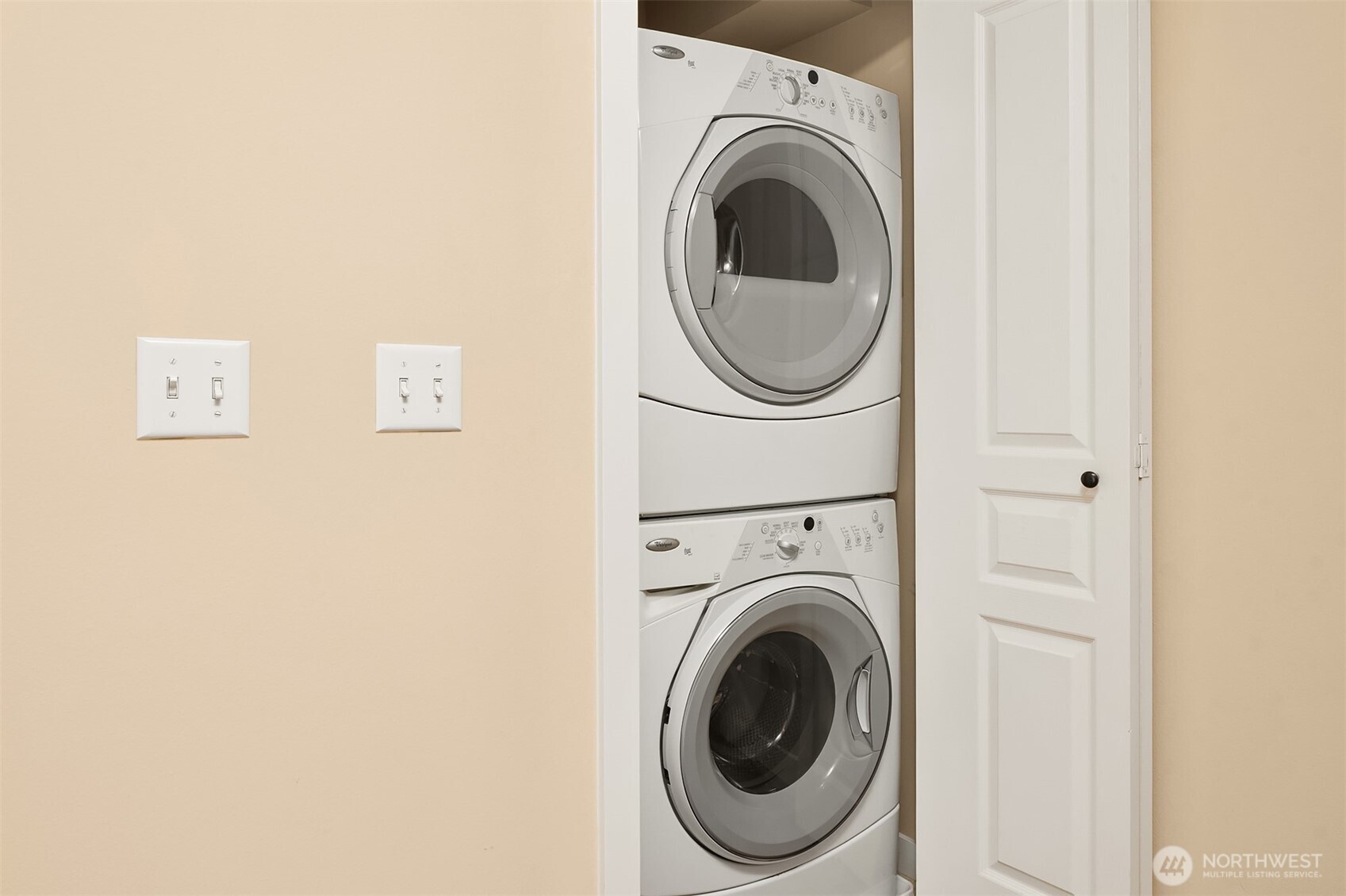 3615 Albion Place North, Unit B Seattle, WA 98103 - Photo 23 of 30 a view of a hallway with washer and dryer