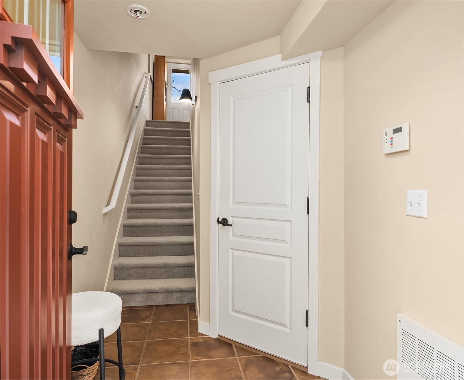3615 Albion Place North, Unit B Seattle, WA 98103 - Photo 26 of 30 a view of entryway with stairs and wooden floor