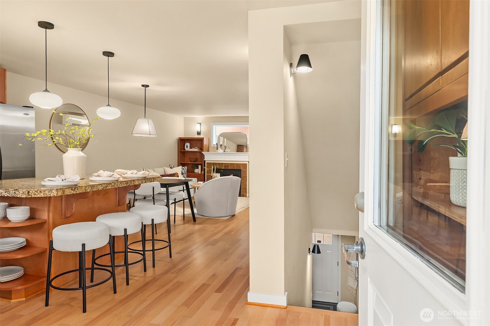 3615 Albion Place North, Unit B Seattle, WA 98103 - Photo 3 of 30 a view of a dining table chairs and entryway