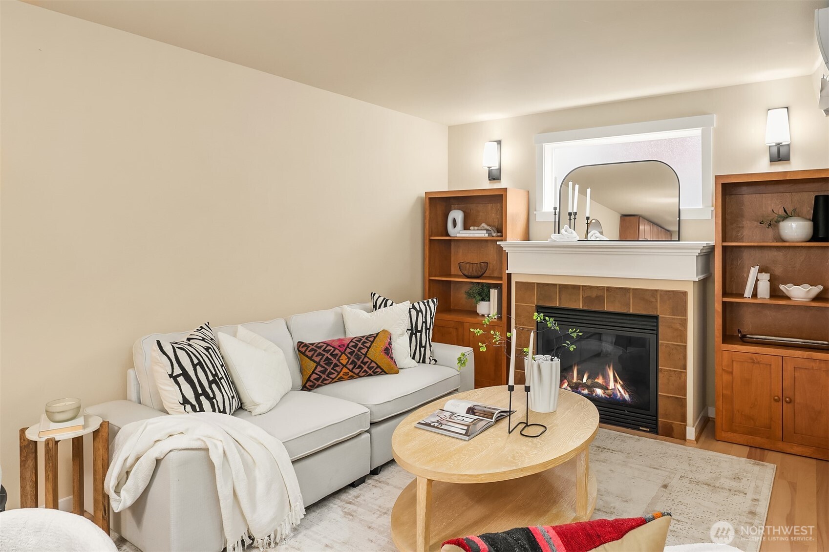 3615 Albion Place North, Unit B Seattle, WA 98103 - Photo 6 of 30 a living room with furniture and a fireplace