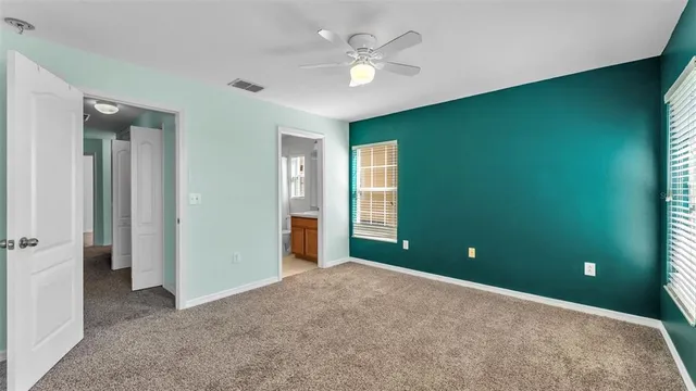 wooden floor and window in an empty room