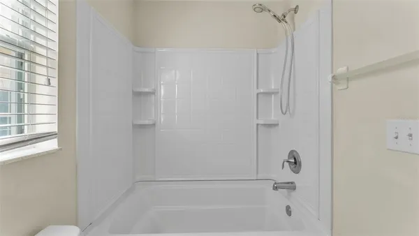 a bathroom with a bathtub