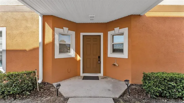 a front view of a house with an outdoor space