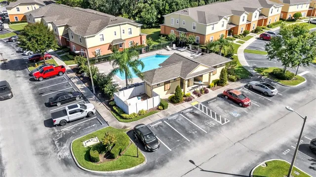 an aerial view of residential house with outdoor space