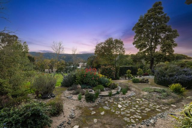 a view of a town with trees around