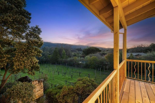 a view of a balcony with lake view