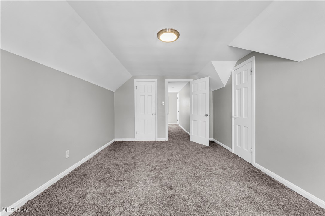 2425 Canterbury Road Cleveland Heights, OH 44118 - Photo 28 of 33 Additional living space featuring carpet floors and vaulted ceiling